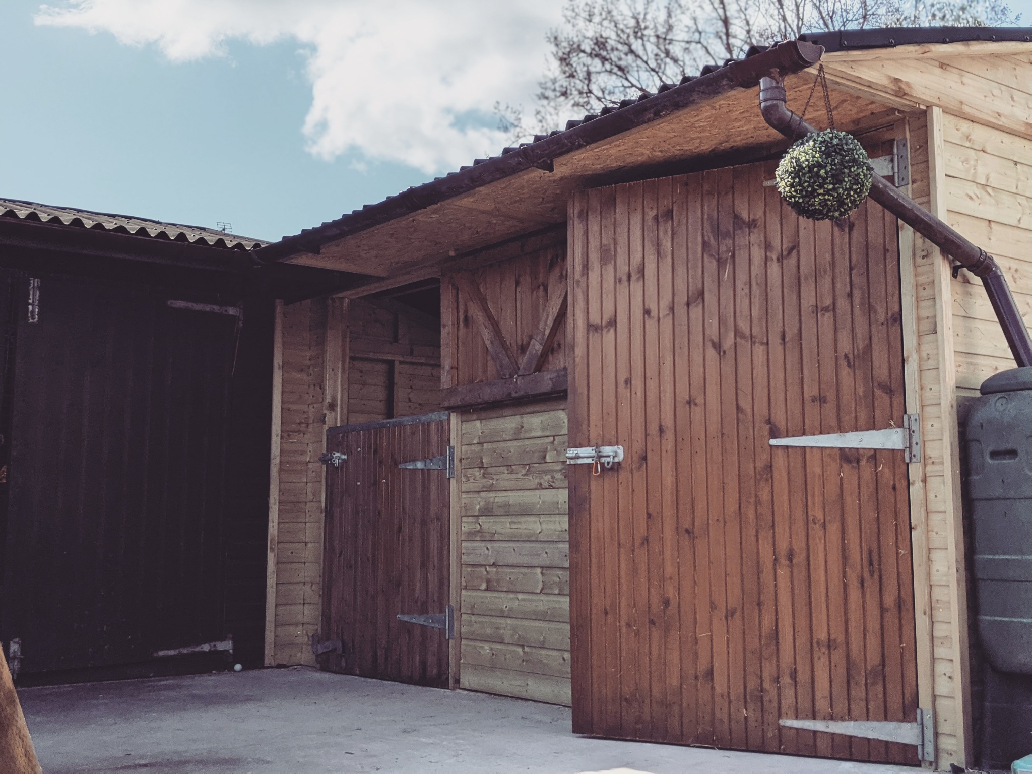 Bespoke timber stable and store with traditional stable doors